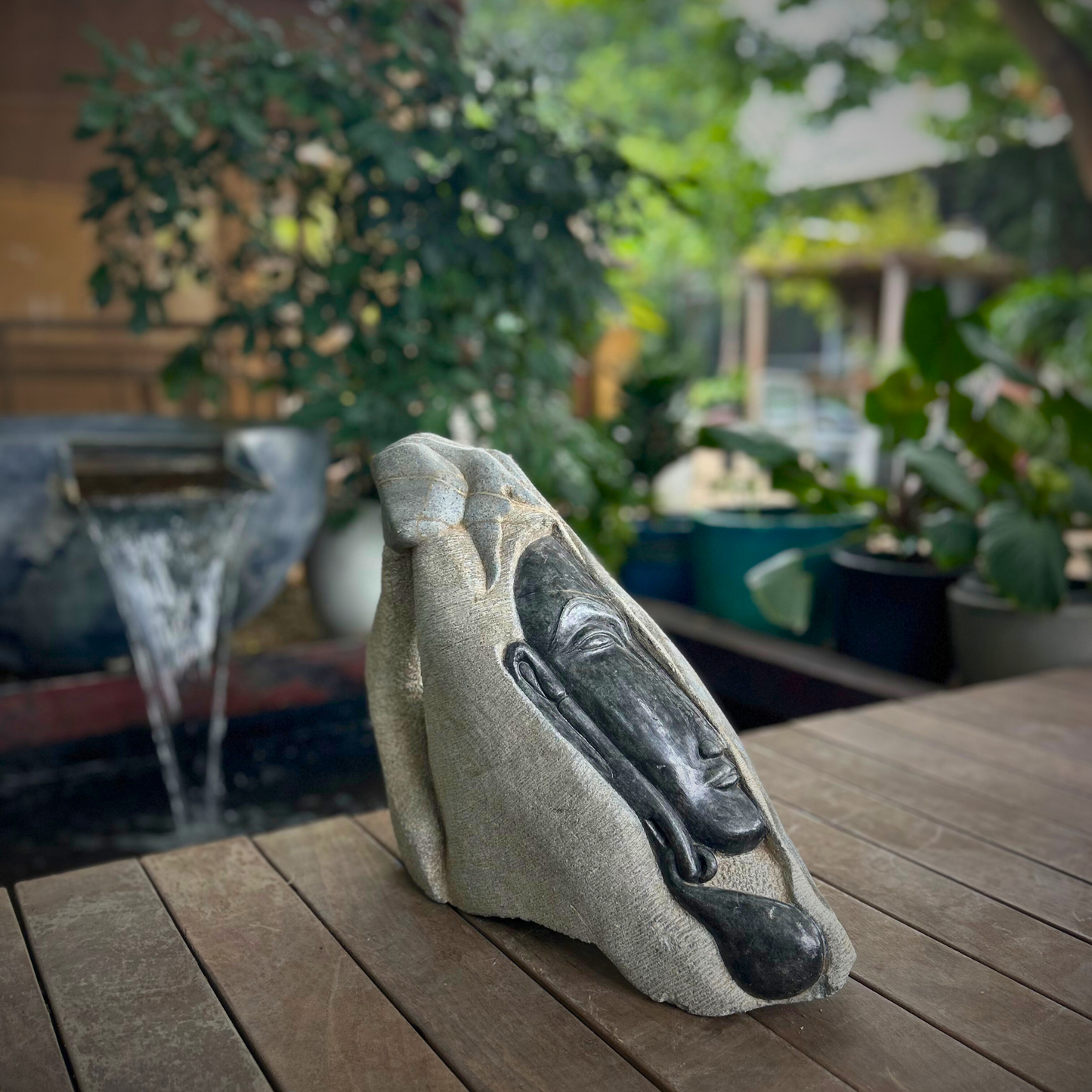 Resting Face Stone Sculpture