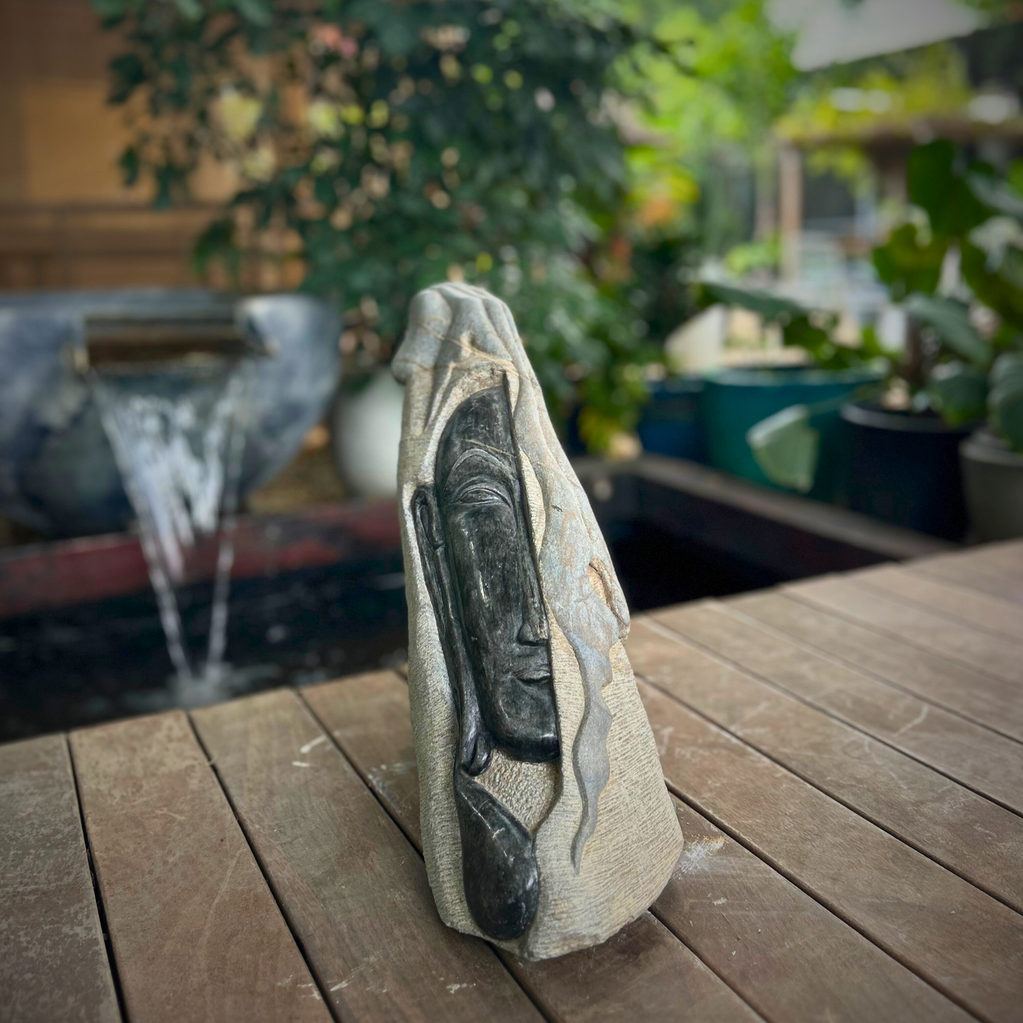 Resting Face Stone Sculpture